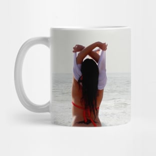 Girl at the beach getting ready for a bath Mug